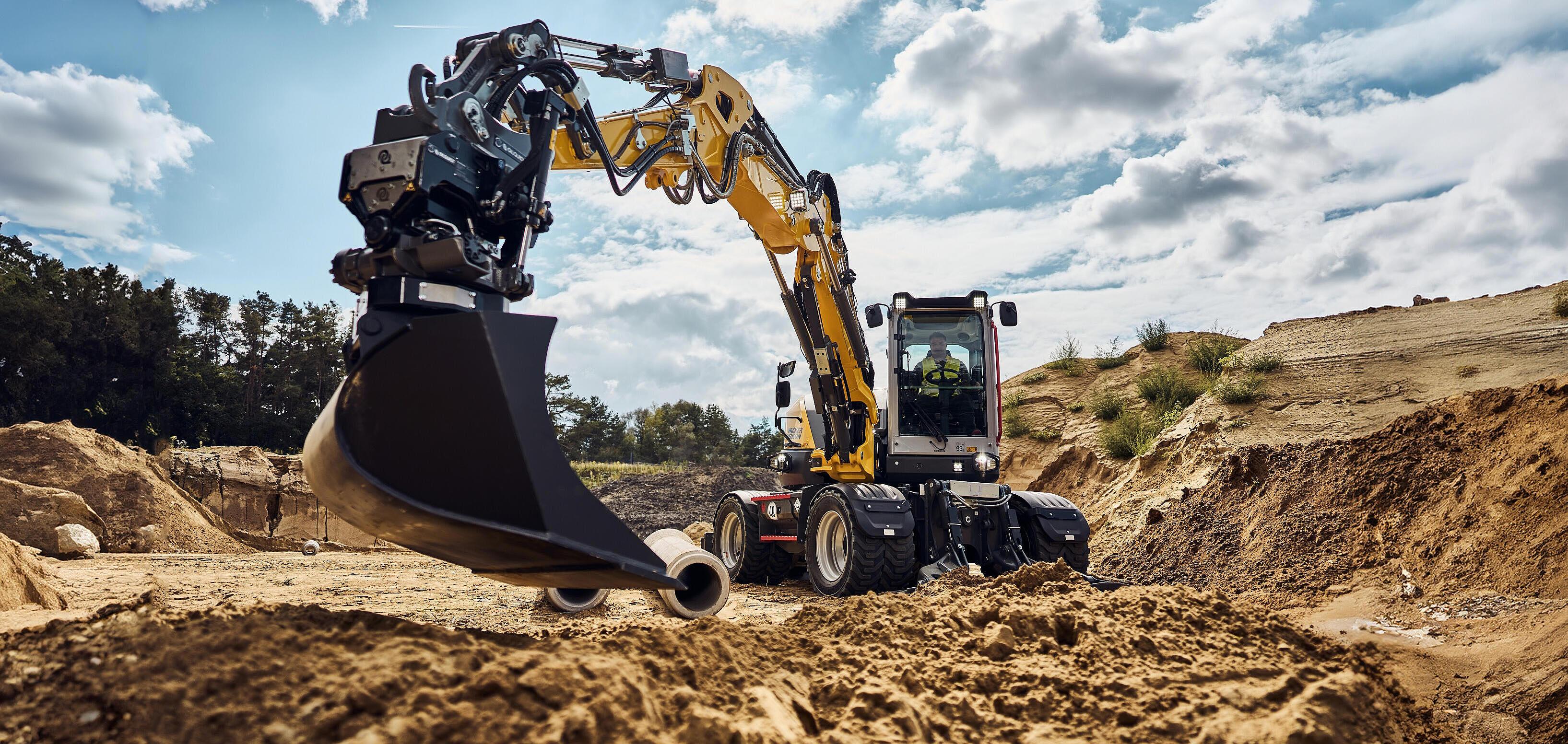 excavator EW100 in action