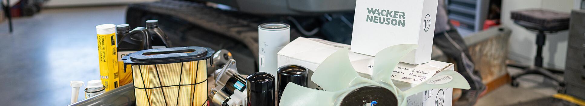 various wacker neuson spare parts in workshop